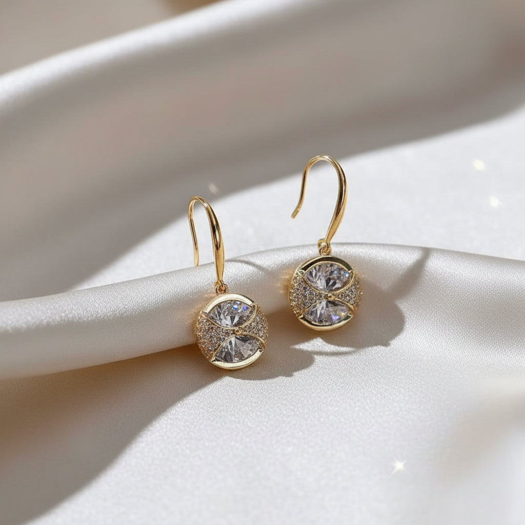Crystal Bow Pavé Earrings on light satin