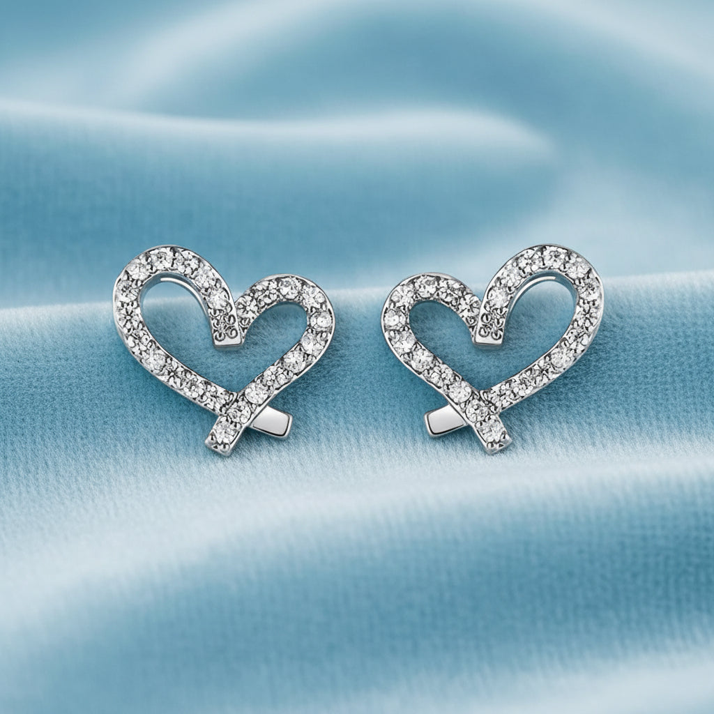 Crystal Open Heart Earrings with clear gemstones on a white background