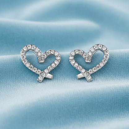 Crystal Open Heart Earrings with clear gemstones on a white background