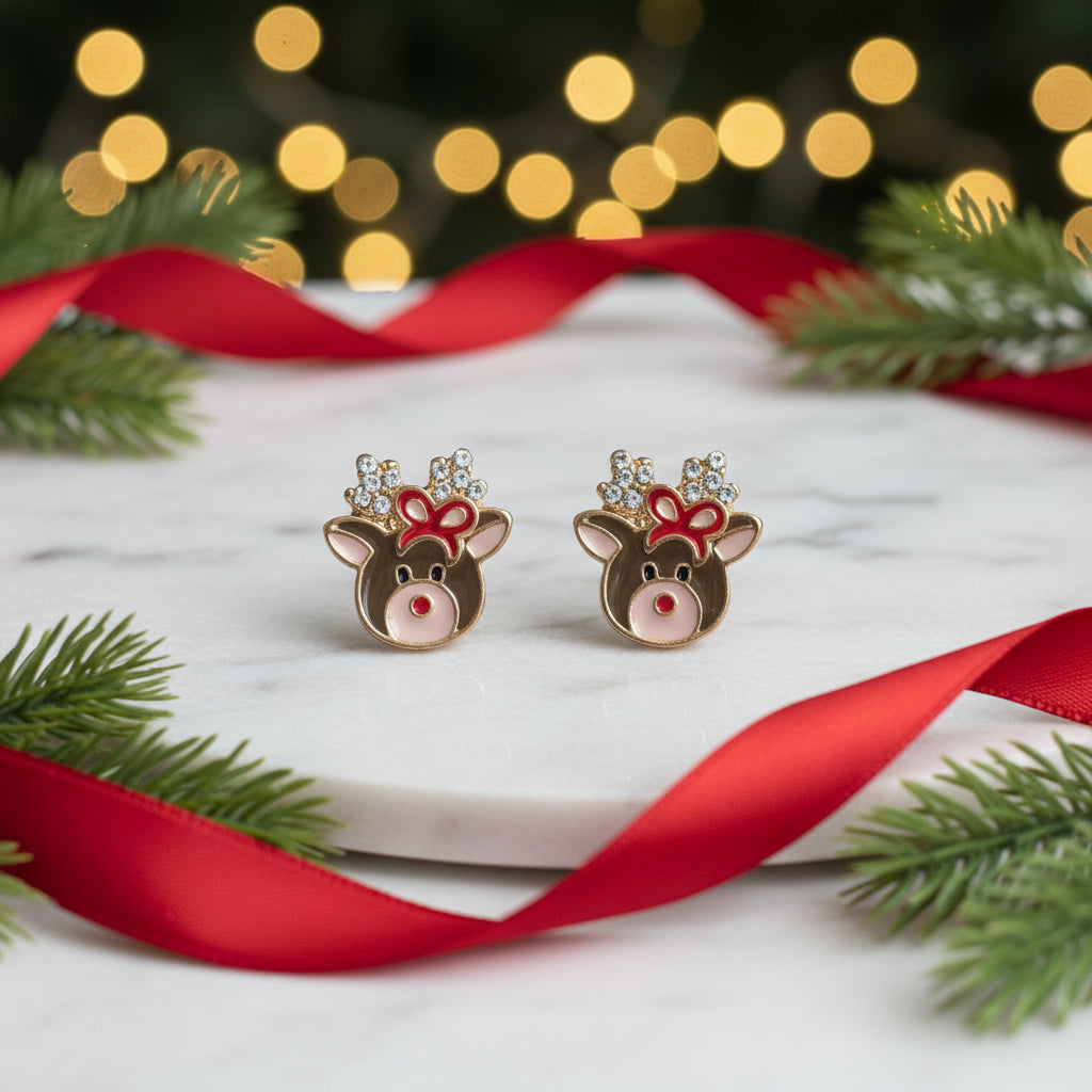 Crystal Reindeer Bow Earrings on marble