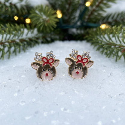 Crystal Reindeer Bow Earrings on snow
