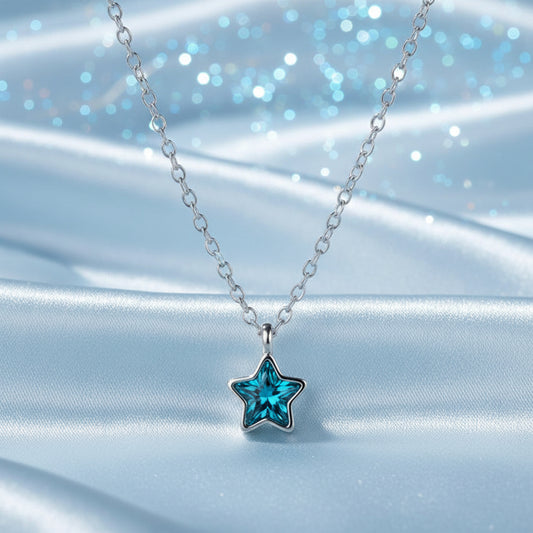 Dainty Silver Blue Star Necklace with a blue star-shaped pendant on a chain.