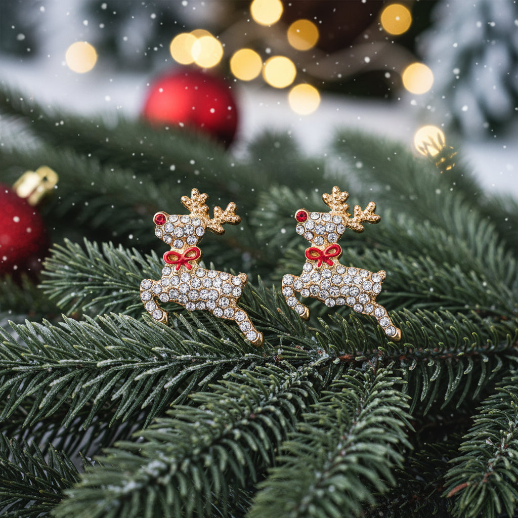 Flying Red-Nosed Reindeer Pavé Earrings on pine bough