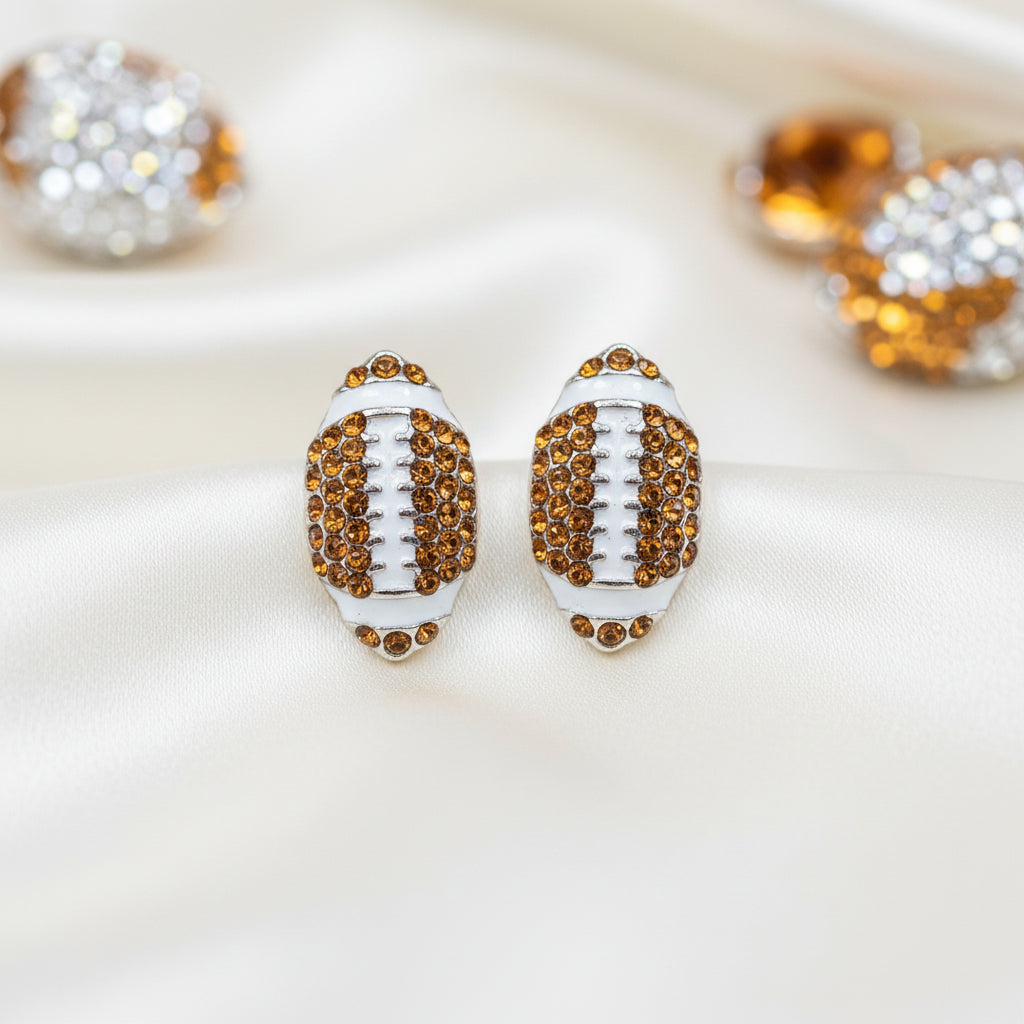 Football Pavé Earrings on white satin