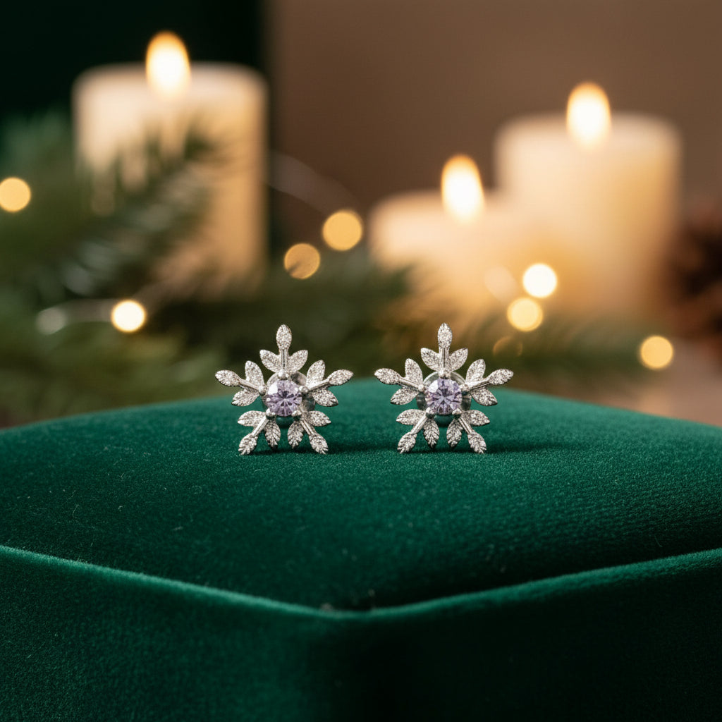 Frosted Crystal Snowflake Earrings on green velvet