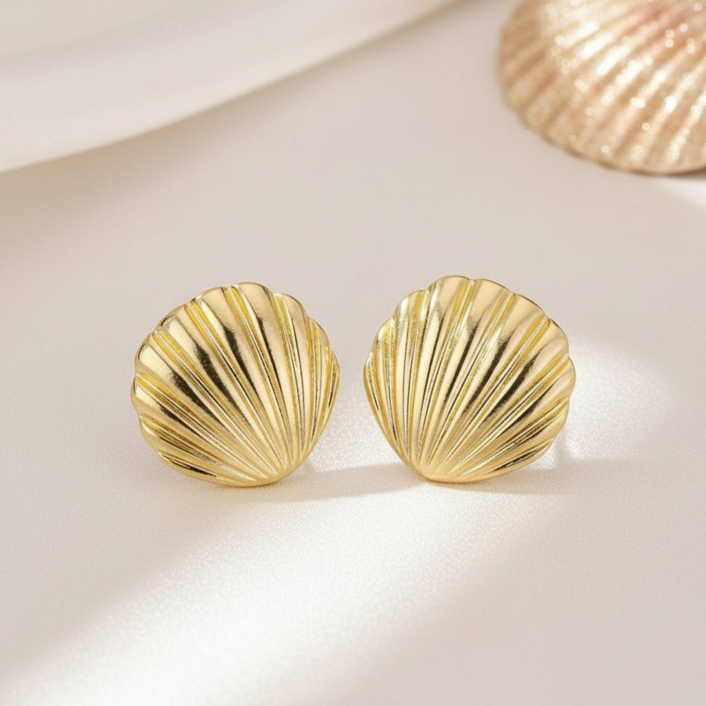 Gold Seashell Statement Earrings on white