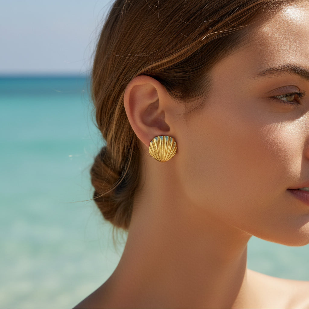 Woman wearing Gold Seashell Statement Earrings