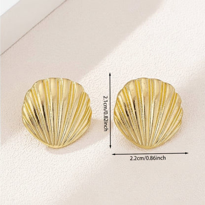 Gold Seashell Statement Earrings with measurements and weight on a light background