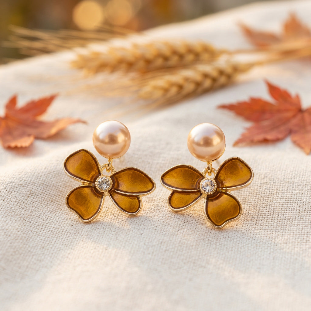 Golden Amber Pearl Flower Earrings on linen in fall setting