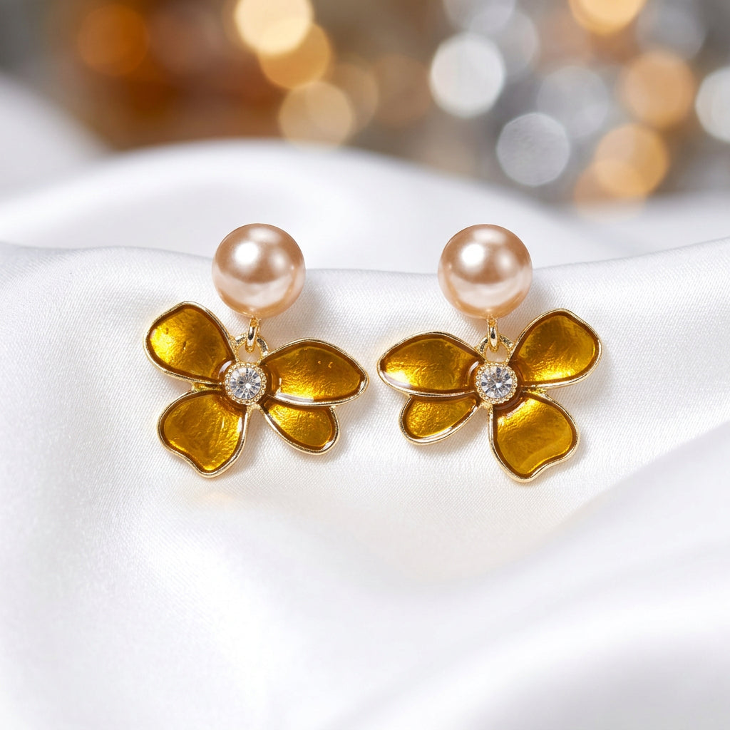 Golden Amber Pearl Flower Earrings on white satin