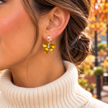 Woman in cream sweater wearing Golden Amber Pearl Flower Earrings