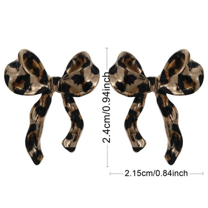 Leopard print bow-shaped earrings with measurements on a white background