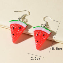 Load image into Gallery viewer, Watermelon slice earrings with measurements on a beige background
