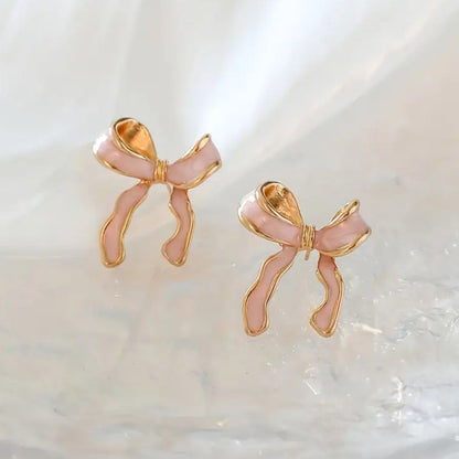 Pink & Gold Bow Stud Earrings on white