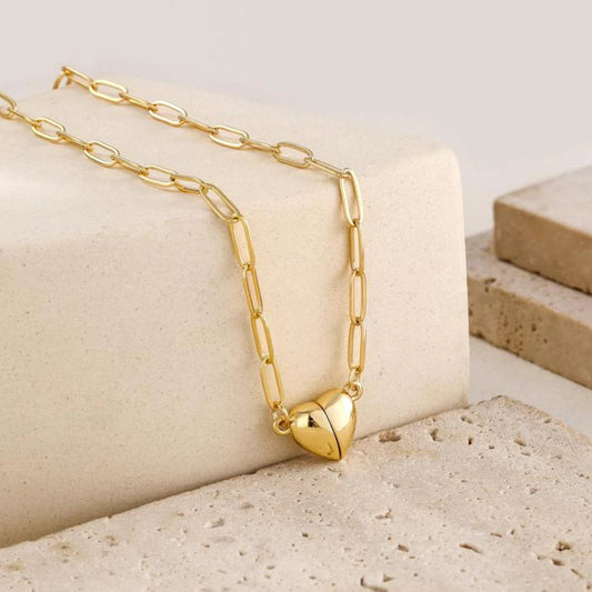 Magnetic Love Heart Necklaceon a beige surface