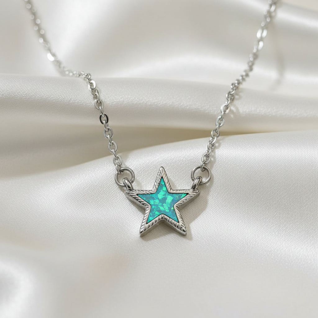 Iridescent Opal Star Necklace with turquoise stone and silver chain on a white background
