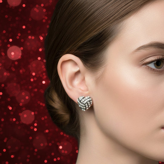 Silver & Black Rhinestone Heart Stud Earrings with rhinestone details on a white card.