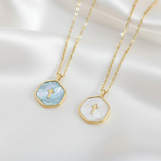 Two Walk in Faith Enamel Cross Necklaces with gemstone pendants on a light background