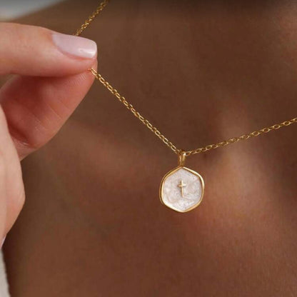 Walk in Faith Enamel Cross Necklace with a circular pendant featuring a cross on a blurred background