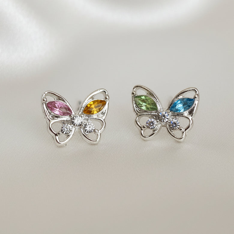 Butterfly-shaped earrings with gemstones on a 'Fashion Jewelry' card.