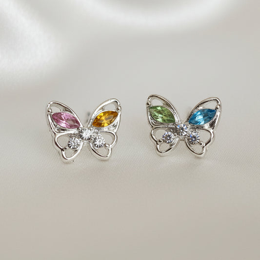 Butterfly-shaped earrings with gemstones on a 'Fashion Jewelry' card.