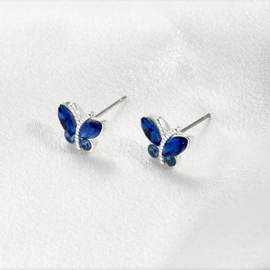 Midnight Blue Butterfly Stud Earrings on a white background