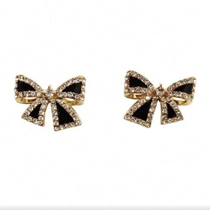 Black Bow Rhinestone Earrings with black centers on a white background