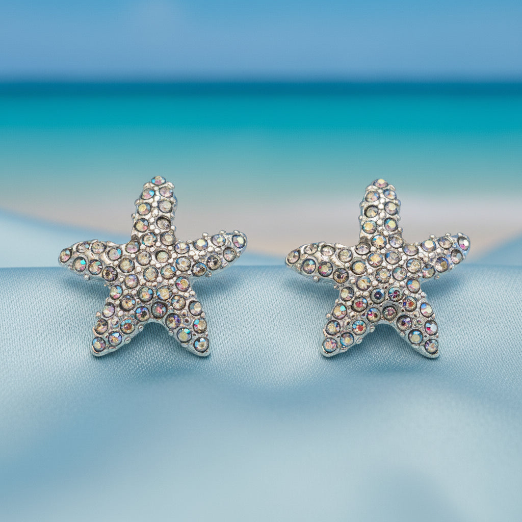 Iridescent Starfish Sparkle Earrings with rhinestones in a beach setting