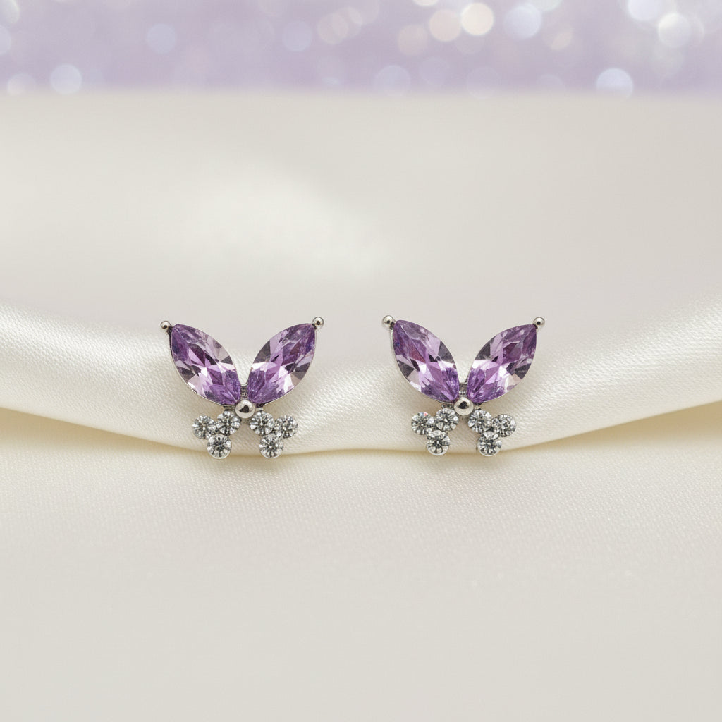 Twilight Lavender Butterfly Earrings on a white round card.