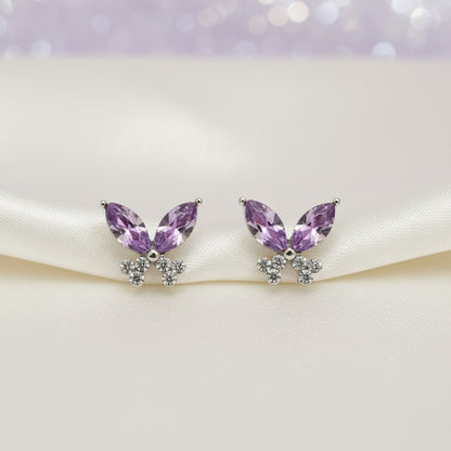 Twilight Lavender Butterfly Earrings on a white round card.