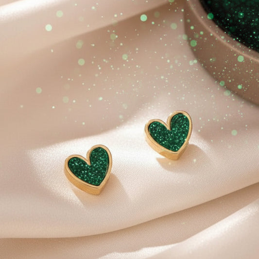 Green Glitter Heart Earrings on a white cloud-shaped stand.