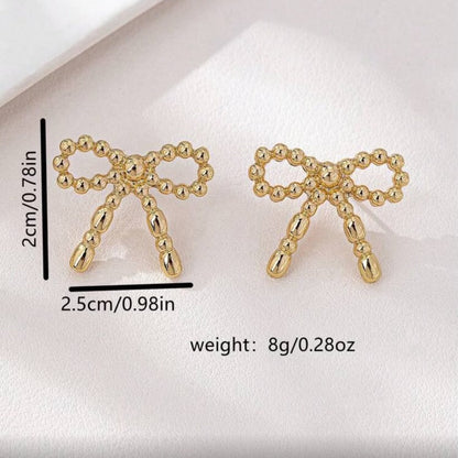 Gold Beaded Bow Earrings with measurements and weight details on a white background