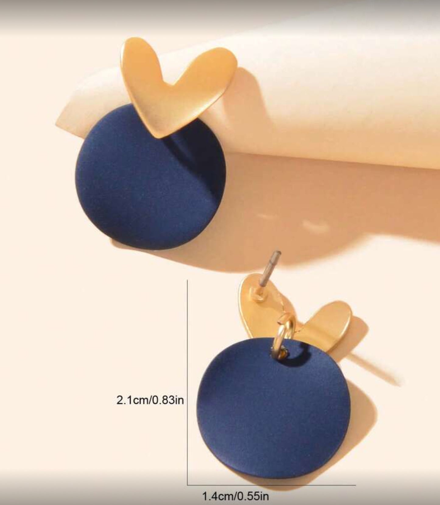 Midnight Blue & Gold Heart Earrings with measurements on a light background