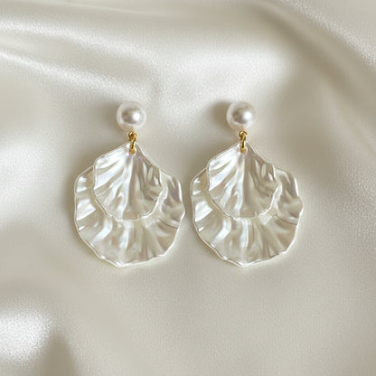 Pearl Shell Earrings on white background