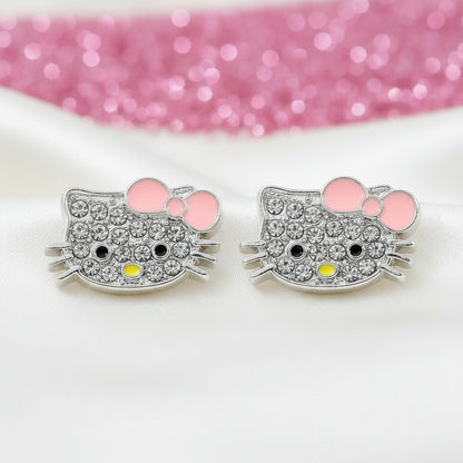 Pink Bow Kitty Pavé Earrings earrings with pink bow and gemstones on a white background