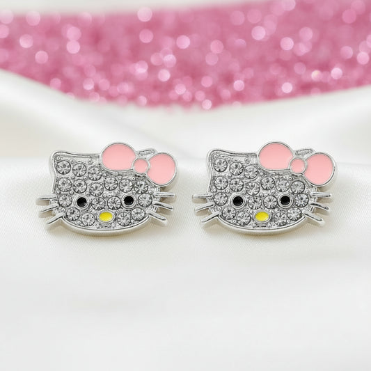Pink Bow Kitty Pavé Earrings earrings with pink bow and gemstones on a white background