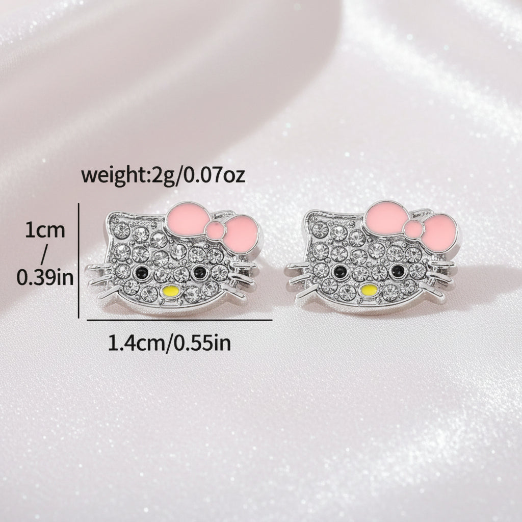 Pink Bow Kitty Pavé Earrings with measurements and weight on a white background