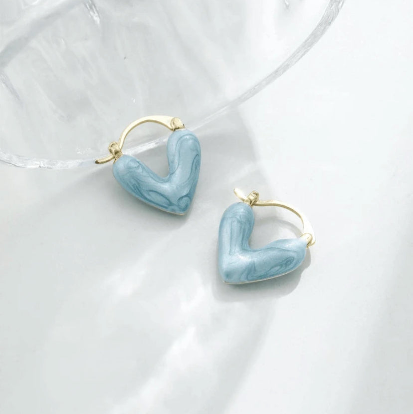 Blue Stone Heart Earrings on a white background