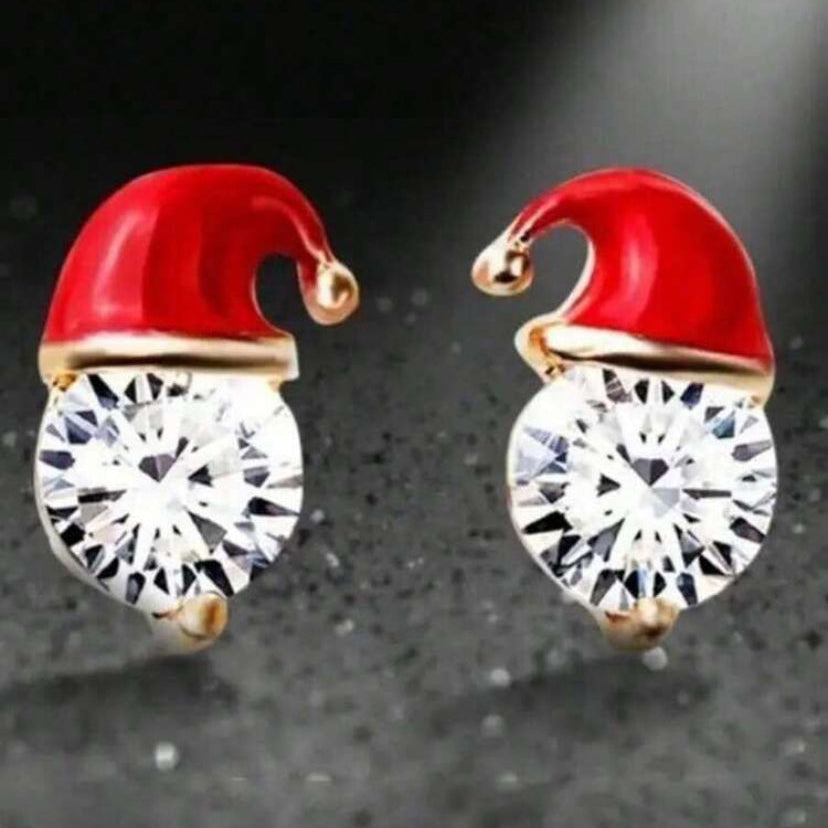 Starlit Santa Earrings on a dark background