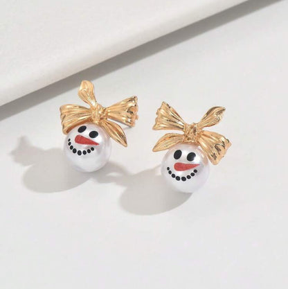 Golden Bow Snowman Earrings on white background