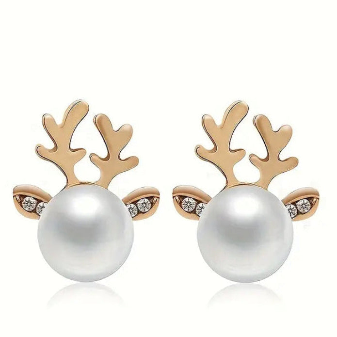 Pair of Snow Pearl Reindeer Earrings with pearl-like balls and gold antler designs on a white background