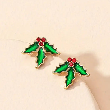 Red Berry Holly Earrings with red berries on a beige background