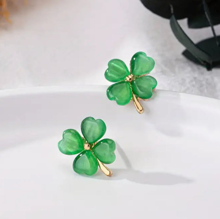 Gold and Green Four-Leaf Clover Shamrock Earrings on a white background