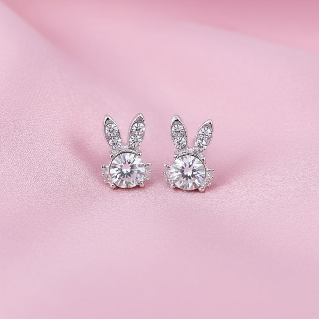 Sweet Bunny Sparkle Earrings on a pink background