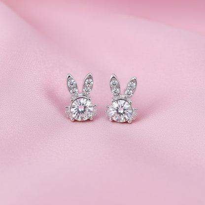 Sweet Bunny Sparkle Earrings on a pink background