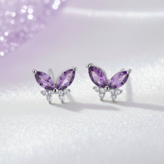 Twilight Lavender Butterfly Earrings with purple gemstones on a soft gradient background