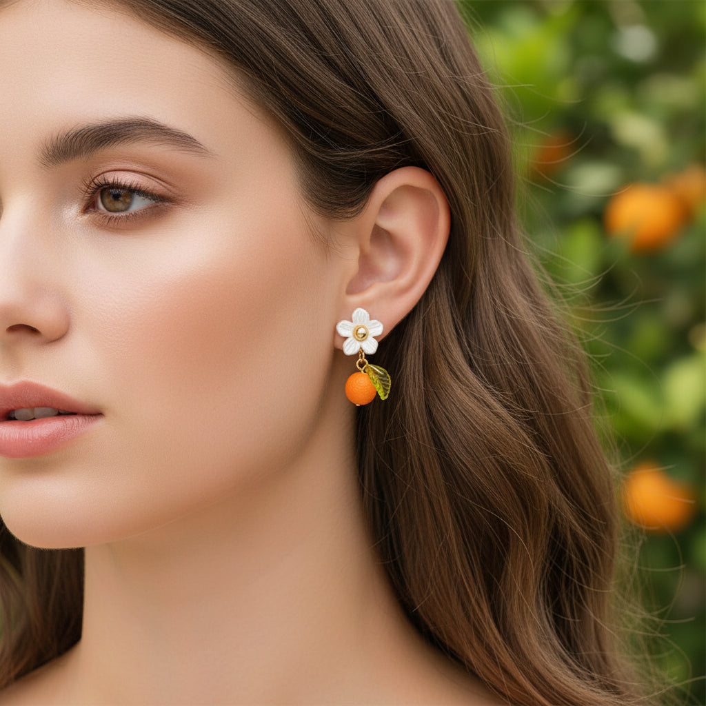 Orange Blossom Dangle Earrings worn by a woman