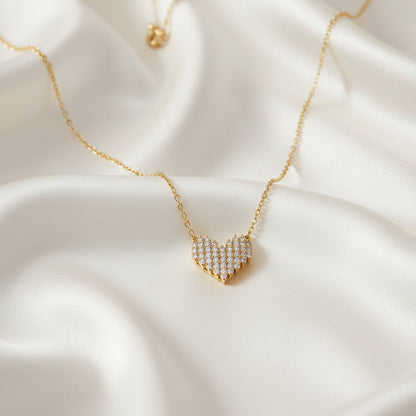 Rhinestone Heart Necklace with a heart-shaped pendant on a soft white fabric background