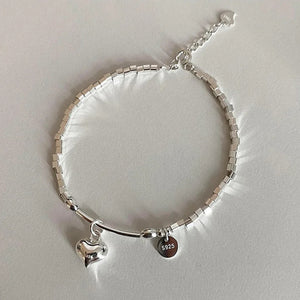 Heart Charm Bead Bracelet made of S925 sterling silver with an adjustable length of 6.5"-7.5".