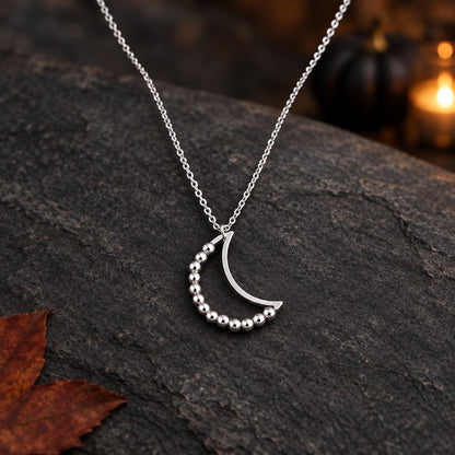 Silver Beaded Crescent Moon Spinner Necklace